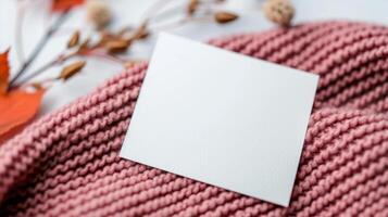 Cozy Knitting Setup With Yarn and Blank Notebook on Soft Sweater in Autumn Setting photo