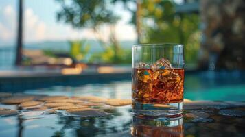 Glass of Whiskey on Table photo