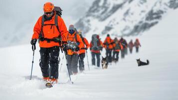 Climbers Trekking Through Snowy Mountains in Winter Conditions photo