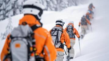 Climbers Trekking Through Snowy Mountains in Winter Conditions photo