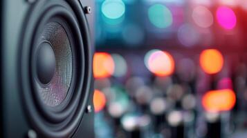 Close-Up of a Speaker With Colorful Bokeh Lights in a Music Studio photo