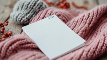 Cozy Knitting Setup With Yarn and Blank Notebook on Soft Sweater in Autumn Setting photo