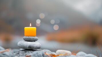 Tranquil Candle Display With Stones and Soft Bokeh Background at Dusk photo