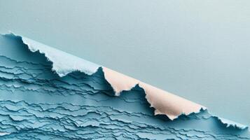 Close-Up View of Frayed Fabric Edge on Soft Blue Material photo