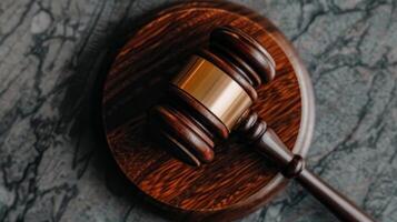 Judges Gavel Strikes Down Decision in Courtroom Setting photo