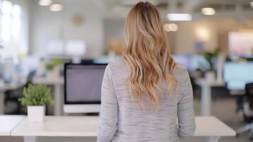 Professional Woman With Long Hair in Modern Office Setting During Daytime photo