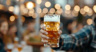 Young Man Holding Beer Mug at Festive Market During Evening Hours photo