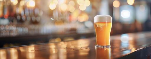 Golden Beer Glass Reflecting Warm Bar Lighting in Evening Hours photo