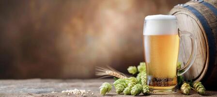 Craft Beer Glass With Foam Beside Hops And Barley Against A Wooden Barrel Background photo