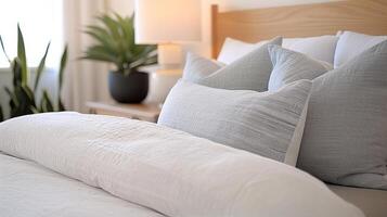 Cozy Bedroom With Neutral Decor and Warm Accent Pillows in Soft Lighting photo