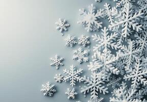 Assorted White Snowflakes on Light Background in Winter Arrangement photo