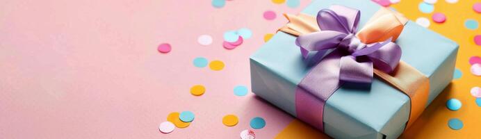 Decoratively Wrapped Gift Box on a Colorful Surface With Confetti photo