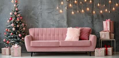 Stylish Pink Sofa Decorated for Christmas With Christmas Tree and Ornaments photo