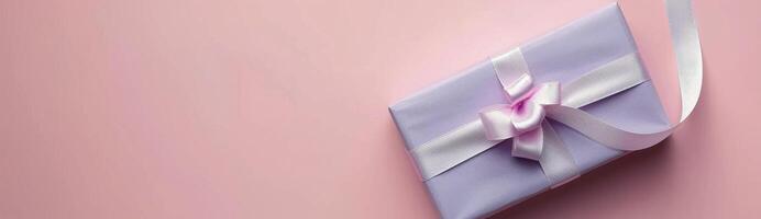 Decoratively Wrapped Gift Box on a Colorful Surface With Confetti photo