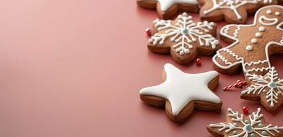 Festive Gingerbread Cookies Arranged on a Red Background for Holiday Celebrations photo