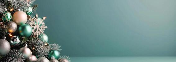 Decorative Christmas Ornaments and Pinecones on a Soft Blue Background photo
