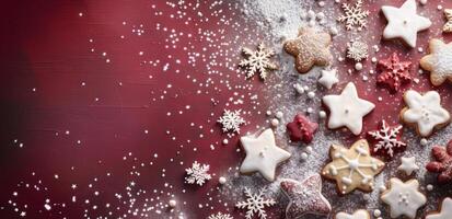 Festive Christmas Cookies and Decorations on Red Background photo