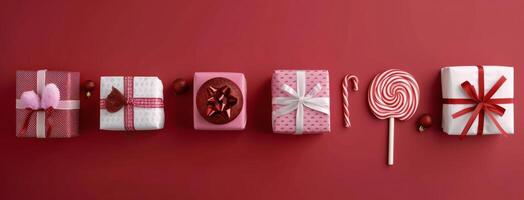 Festive Christmas Gifts and Ornaments Displayed on Red Background photo