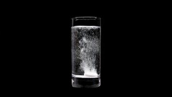The tablet dissolves in water with alpha channel video