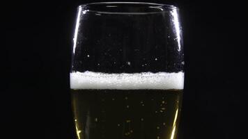 Close-up of beer foam pouring around the edges video