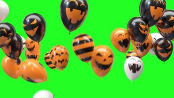 Halloween balloons transition on a green background video
