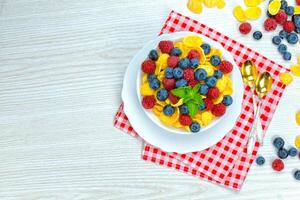 cornflakes, breakfast of cornflakes and berries photo