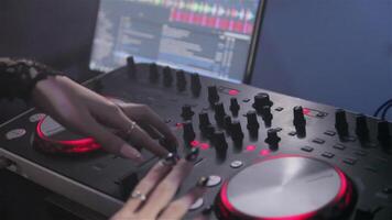 DJ plays on the remote in a nightclub. Close-up of DJ Console. video