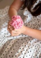 Girl Stretching Slime. Girl Playing with Pink Slime photo