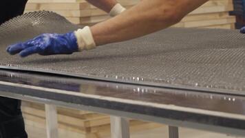 Metallic framework of the forthcoming partition is meticulously crafted by hand in the realm of furniture manufacturing. video