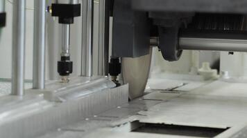 Circular saw operates with precision, producing no sparks, and cuts through a piece of metal with ease in an automatic mode. video