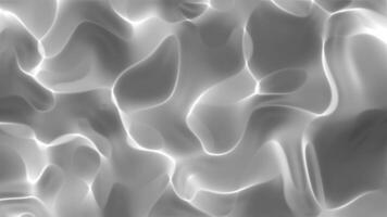 Seamless abstract wavy texture in shades of gray, resembling flowing water or smoke loop. Soft, smooth lines create a sense of movement and depth. video
