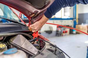 starting the car engine using the starter cable photo