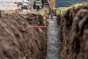 concrete in the ground for the foundation of the building photo