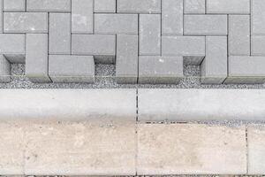 concrete blocks for the construction of sidewalks and roads photo