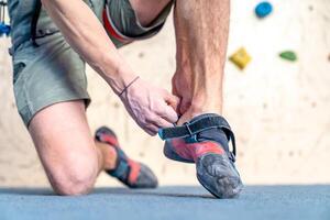 climbing shoes of an athlete in a climbing center photo