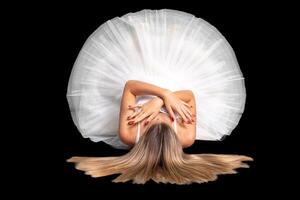 portrait of a ballerina in a pose, black background photo