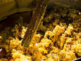 Apiary. Wax is melted from used honeycombs. Background photo