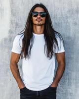 A model showcases a blank t-shirt, exuding confidence with long, flowing hair photo