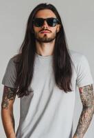 Model showcases a blank t-shirt with a striking confident pose photo