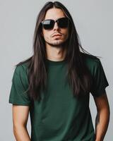 Model flaunts a blank t-shirt and sunglasses with a striking pose photo