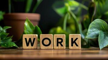 A wooden block with the word WORK written on it photo