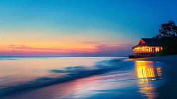Waves gently lap the shore as the sun sets, casting golden reflections on water photo