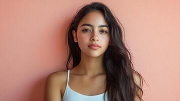A young model exudes confidence with her captivating gaze and flowing hair photo