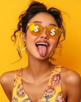 A cheerful woman expresses fun and confidence with playful sunglasses photo