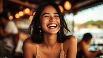 A young woman beams with happiness while enjoying a cheerful gathering photo