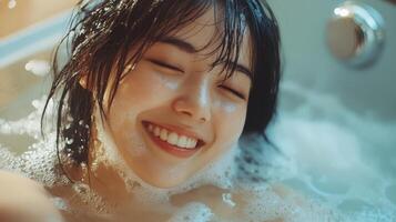 A woman enjoys a blissful soak surrounded by bubbling water and sunlight photo