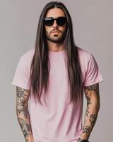 A handsome model displays a blank t-shirt with a confident attitude photo