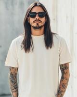 Model displays a blank t-shirt with confidence in a modern urban environment photo