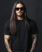 Model displays a blank t-shirt, exuding confidence with long hair and tattoos photo