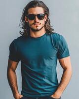 A handsome model confidently wears a blank t-shirt in an urban backdrop photo